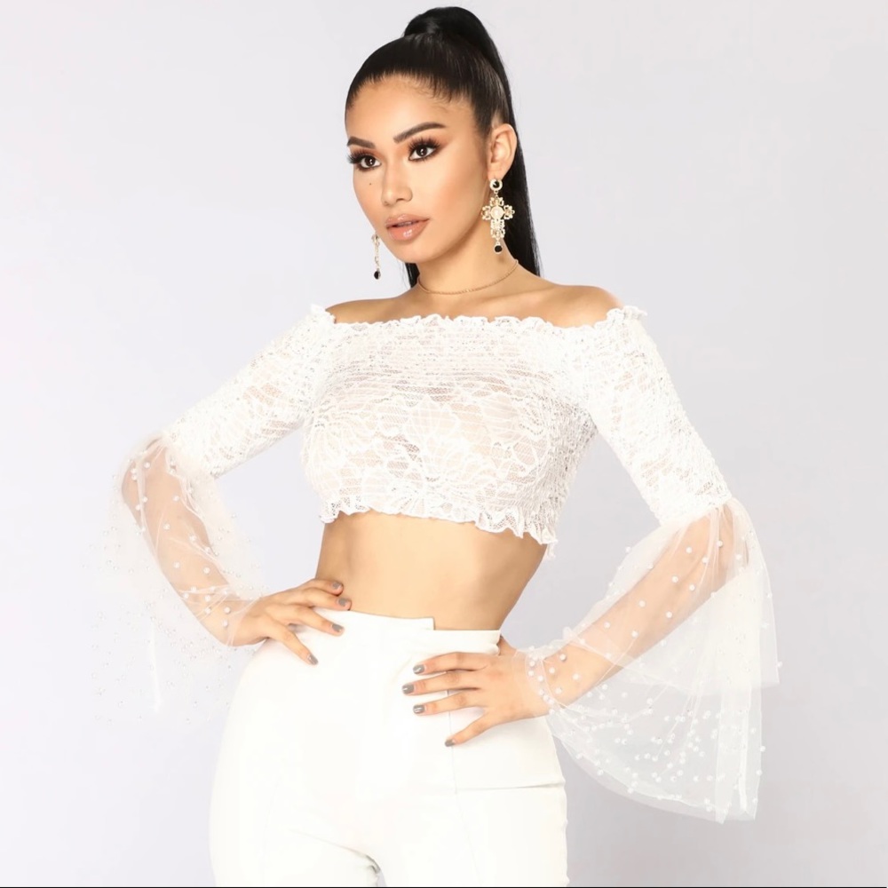 Off the shoulder bell sleeve crop top.